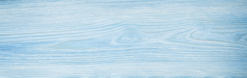 The image displays a textured surface resembling wooden planks with a blue paint finish