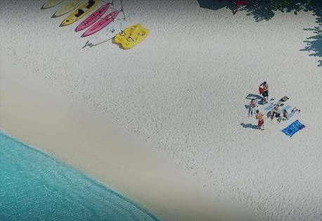 The image shows a beautiful beach scene viewed from above