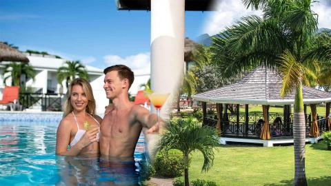 Couple enjoying resort pool and serene tropical garden gazebo with mountain view