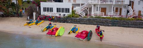 Grand Anse Beach Palace Hotel Beachfront View Grand Anse Beach Palace Hotel with water sports equipment on sandy beach