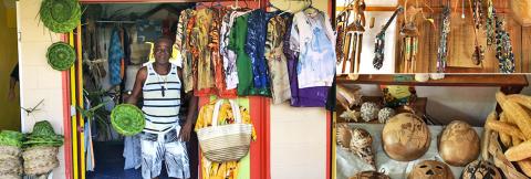 Vibrant Local Market With Handcrafted Goods Colorful local market with handmade crafts, clothes, and artisan items attracting tourists