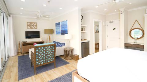 Cozy studio apartment interior with modern decor and natural light.