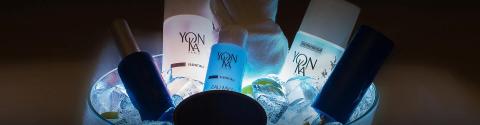 Yon-Ka Paris skincare products arranged with ice for a refreshing look