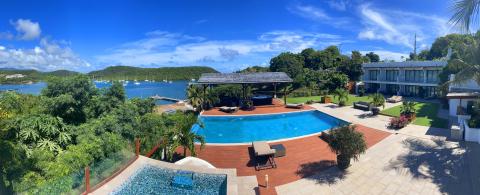 Luxurious bay view home with pool, hot tub, and garden perfect for relaxation.