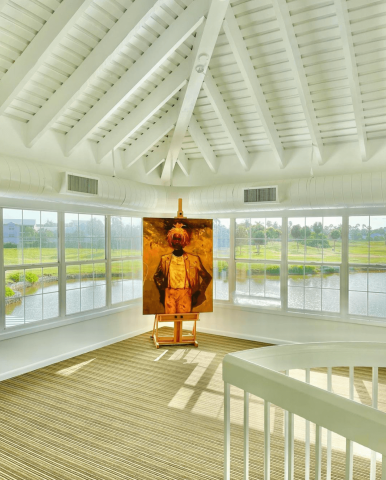 This image shows a bright and sleek interior, possibly within a modern building with an architectural emphasis on natural light