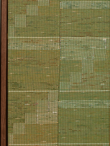The image shows a close-up view of a woven fabric, possibly a screen or textile art, enclosed within a wooden frame