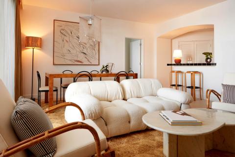 This image showcases a stylish interior living space with a minimalist and cozy design