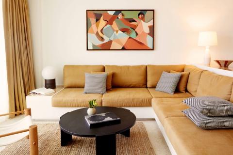 This image shows a stylish living room with a cozy and modern design