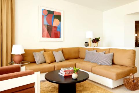 This image features a stylish living room interior