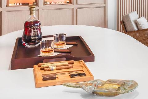 Appleton Estate 30-Year Rum and cigars on tray with whiskey glasses and ashtray.