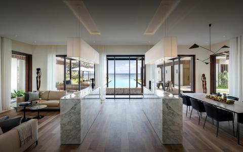Luxurious coastal home interior with infinity pool and ocean view
