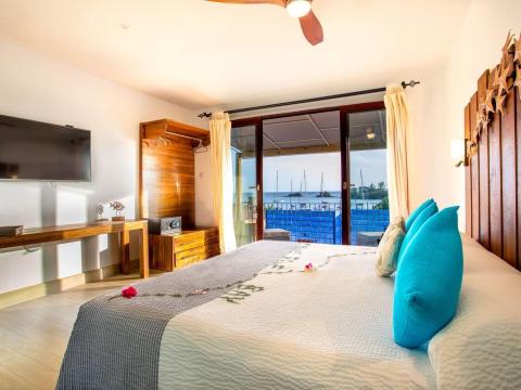 Luxurious bedroom with scenic ocean view and elegant decor
