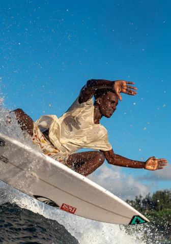 Barbados Surfing Adventure Captured in Action Surfer riding waves in Barbados