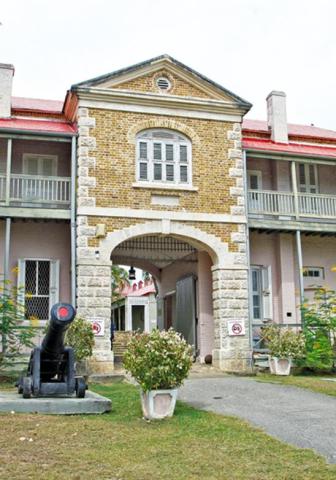 Barbados Historical Architecture and Legacy Barbados historical building with a cannon and archway