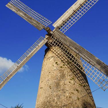 Barbados Historic Windmill Windmill structure against a clear blue sky in Barbados
