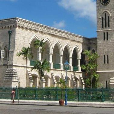 Barbados Vibrant Cultural Heritage and Architecture Barbados historic building with a pedestrian nearby