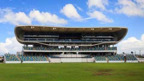 Barbados Modern Sports Venue Captured on a Sunny Day Modern sports stadium in Barbados with seating and open design