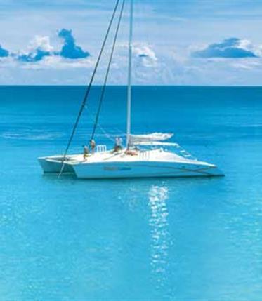 Barbados Boating and Clear Waters Catamaran sailing on the clear waters of Barbados