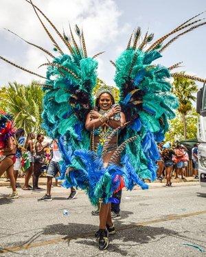 Barbados Festival Vibes Captured in Lively Photo Vibrant cultural festival in Barbados with costumes and music