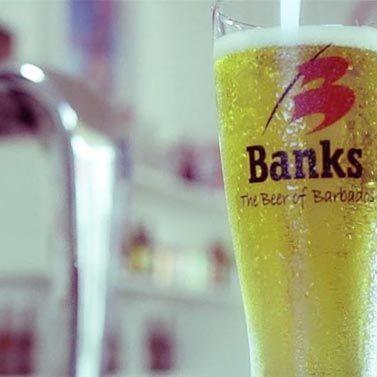 Barbados Local Beer Experience Banks beer glass highlighting Barbados brewery