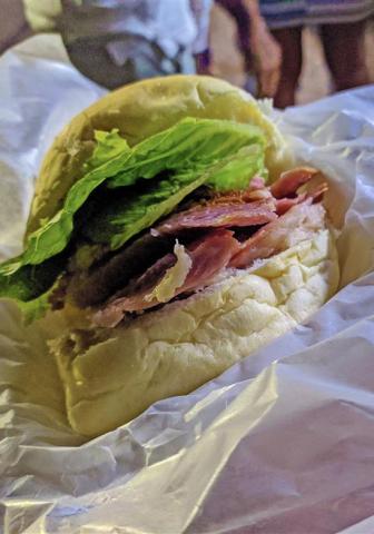 Barbados Delicacy: A Ham and Lettuce Sandwich Close-up view of a sandwich with ham and lettuce