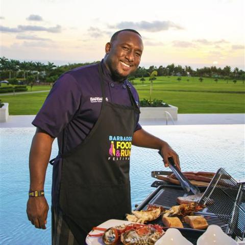 Barbados Culinary Delights at Food and Rum Festival Chef preparing food at a Barbados food and rum festival