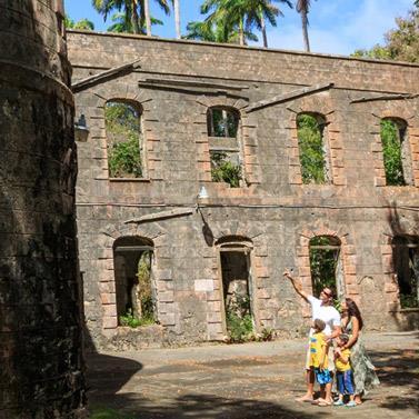Barbados Historic Site with Visitors Visitors exploring historical ruins in Barbados