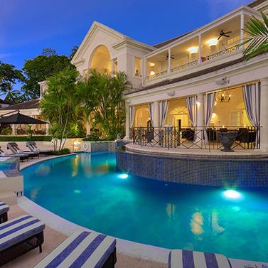 Barbados Luxury Hotel Experience with Twilight Pool Luxury hotel and pool in Barbados at twilight