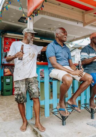 Barbados Cheer and Culture at a Local Hangout People enjoying at a bar scene in Barbados