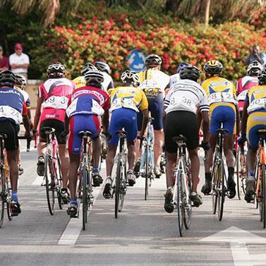 Barbados Cycling Event Captured in Action Cyclists participating in a bike race in Barbados