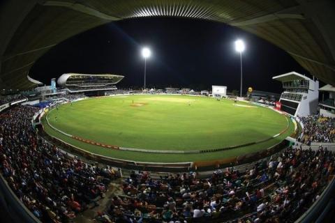 Barbados Sports Venue Bustling with Enthusiastic Crowd Nighttime view of a sports event in Barbados with spectators