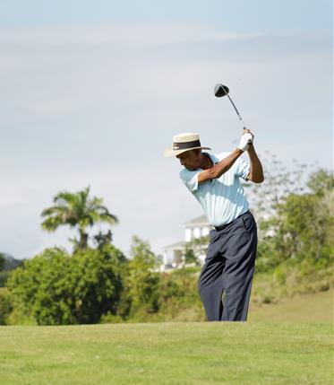 Barbados Scenic Golfing Experience Golfer playing on a sunny day in Barbados