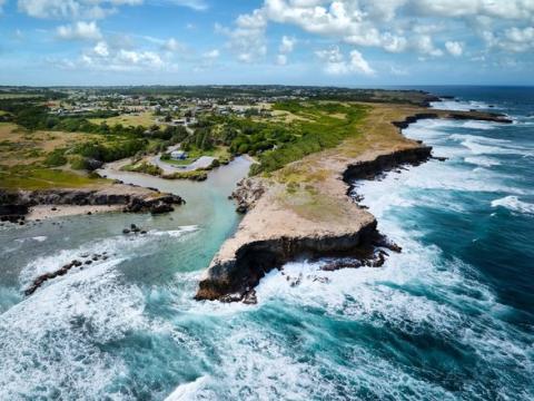 Barbados Awe-Inspiring Coastline Aerial view of Barbados coastline with breaking waves