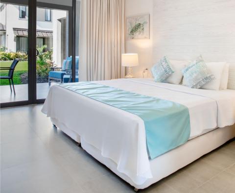 The image shows a modern bedroom