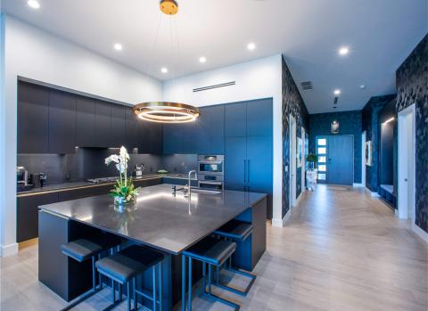 The image depicts a modern kitchen with a sleek and stylish design