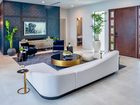 The image shows a modern and stylishly decorated living room