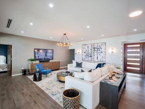 This image shows a spacious and well-decorated living room
