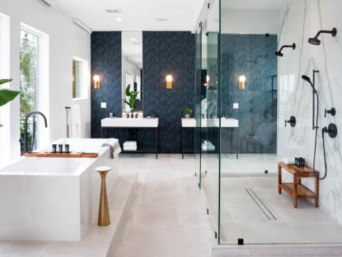 This image features a modern and luxurious bathroom design