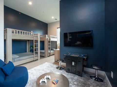 This image shows a contemporary room designed primarily for entertainment and relaxation