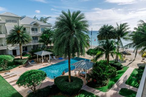 This image features a scenic view of a beach resort area