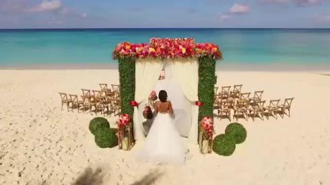 This image shows a beautiful beach wedding setup