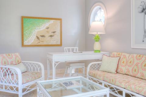 This image features a bright and airy coastal-themed living room