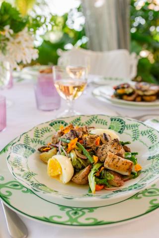This image shows a beautifully plated meal on a table that seems perfect for a delightful dining experience