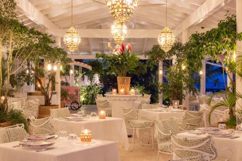 This image shows an elegant and beautifully decorated dining area, likely part of a restaurant