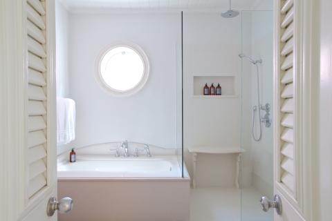The image shows a bright and clean bathroom