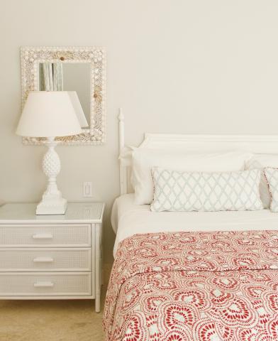 This image features a neatly styled bedroom setting