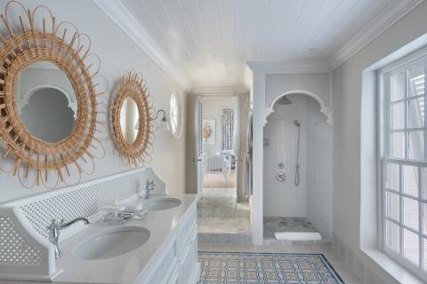 This image features a stylish bathroom interior