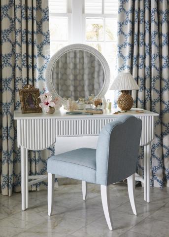 This image features a stylish indoor setting with a vanity area