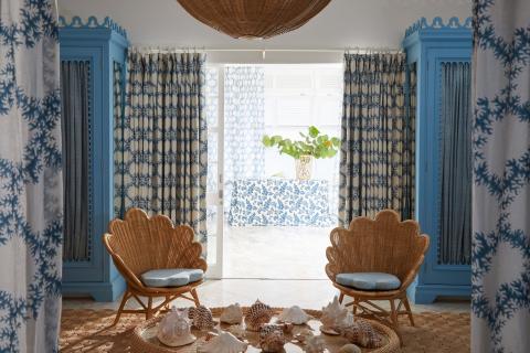 This image shows a beautifully decorated room with a coastal or beach theme