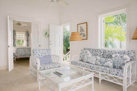 This image depicts a bright, tropical-style interior